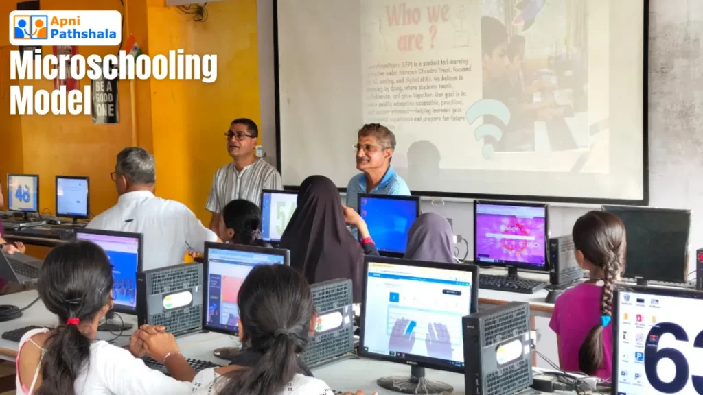 Anirudha Malpani leading a session in a computer learning POD, inspiring students with hands-on digital education and skills development. Showcashing how apni pathshala goals align with National Science Seminar.