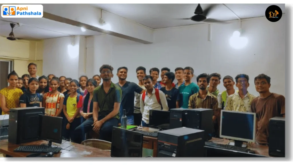 Group of LFP (Learn From Peers) students in computer lab—POD classroom photo used to discuss completion rates in free vs paid courses.