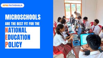 Image showing students in a microschool using computers, highlighting how microschools align with NEP 2020 through small sizes, personalized learning, and technology integration.